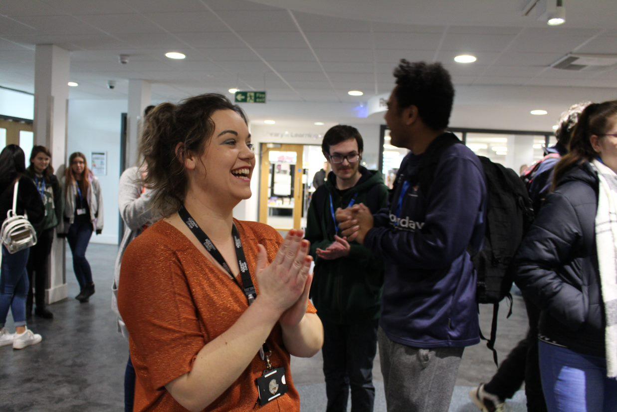 Staff and students celebrate the opening